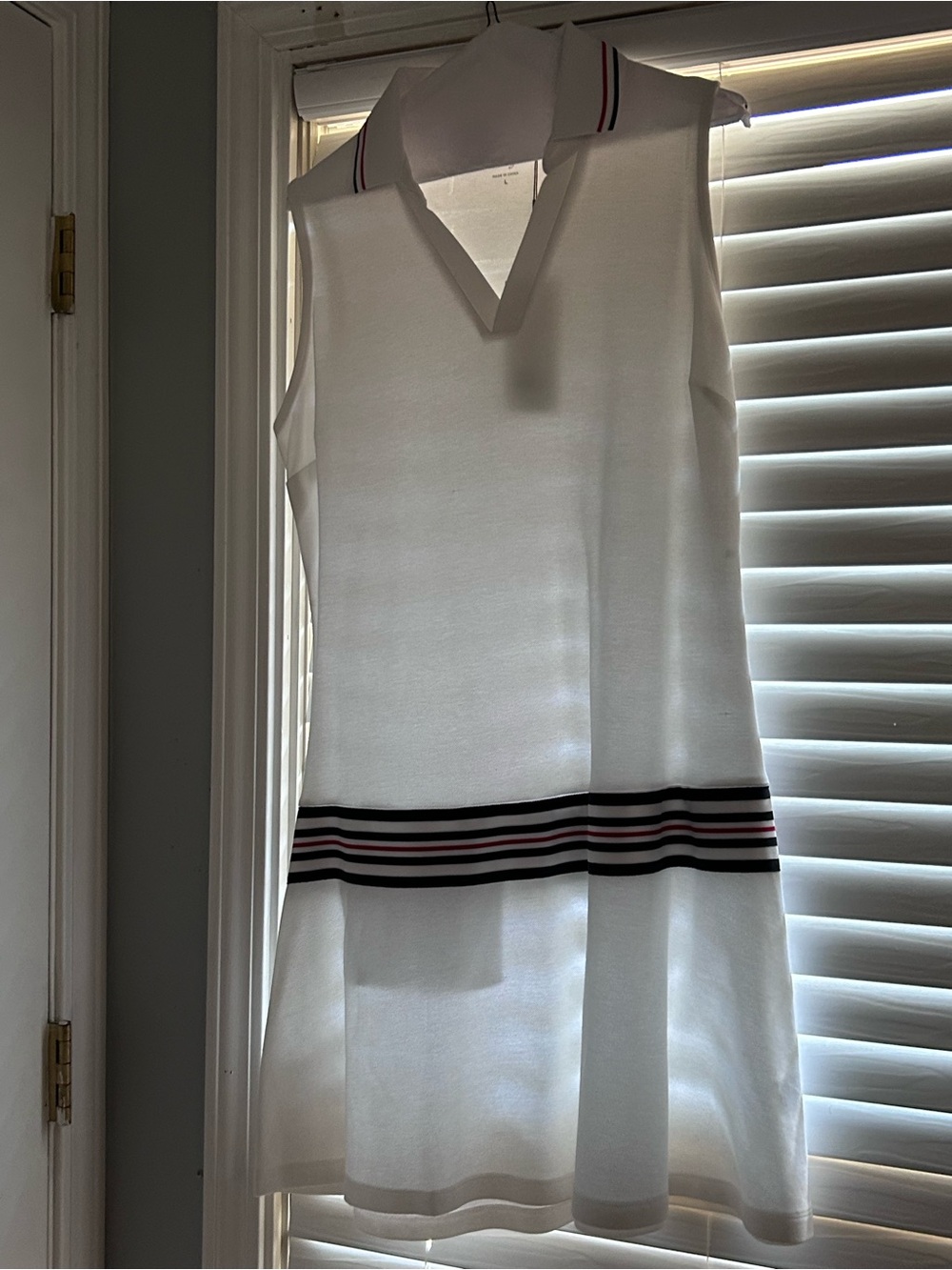 Sleeveless White Polo Dress with Stripe Detail